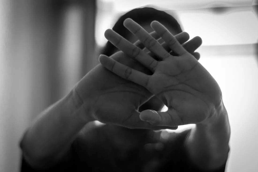 woman-covering-face-with-hands
