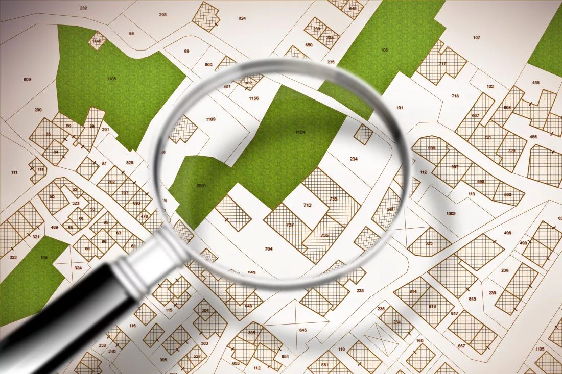 high-angle-view-magnifying-glass-map